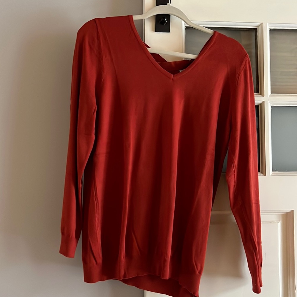 Pullover sweater with cross cross detail down back